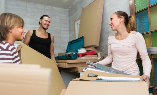 Office relocation planning in Stoke Newington with moving boxes and workstations
